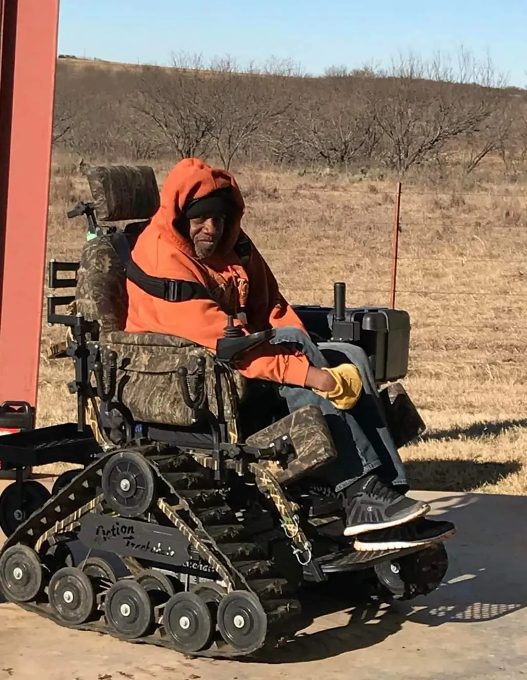 Veteran hunter in a track chair.